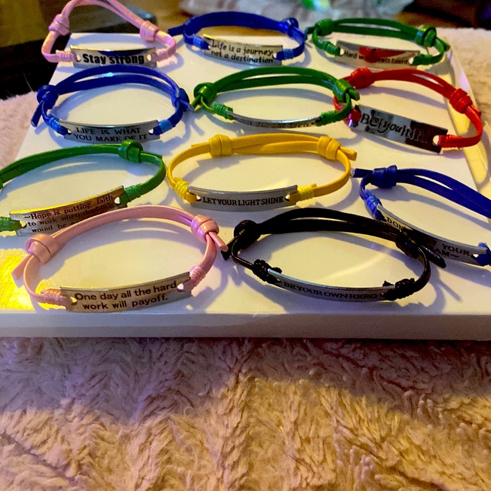 Set of 12 inspiration adjustable leather bracelets.